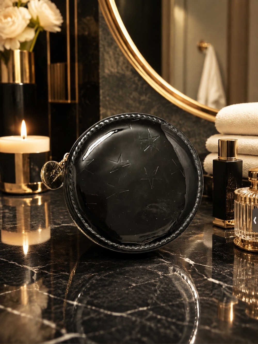 Yves Saint Laurent Black Patent Round Cosmetic Pouch with Star Embossing